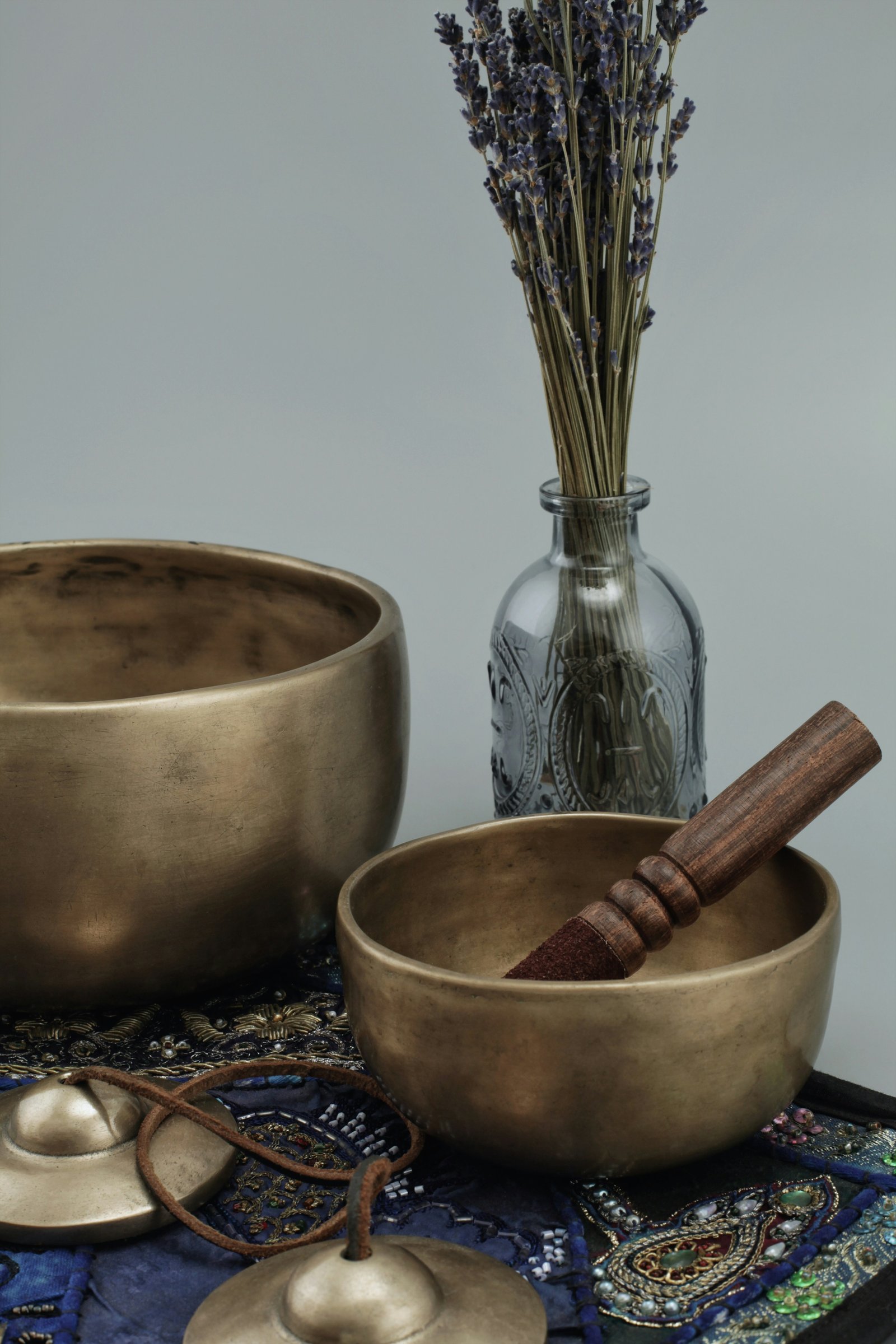 A simple wooden mortar and pestle, plain and deliberate
